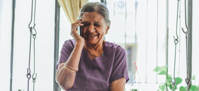 old woman on phone rcom reliance communications